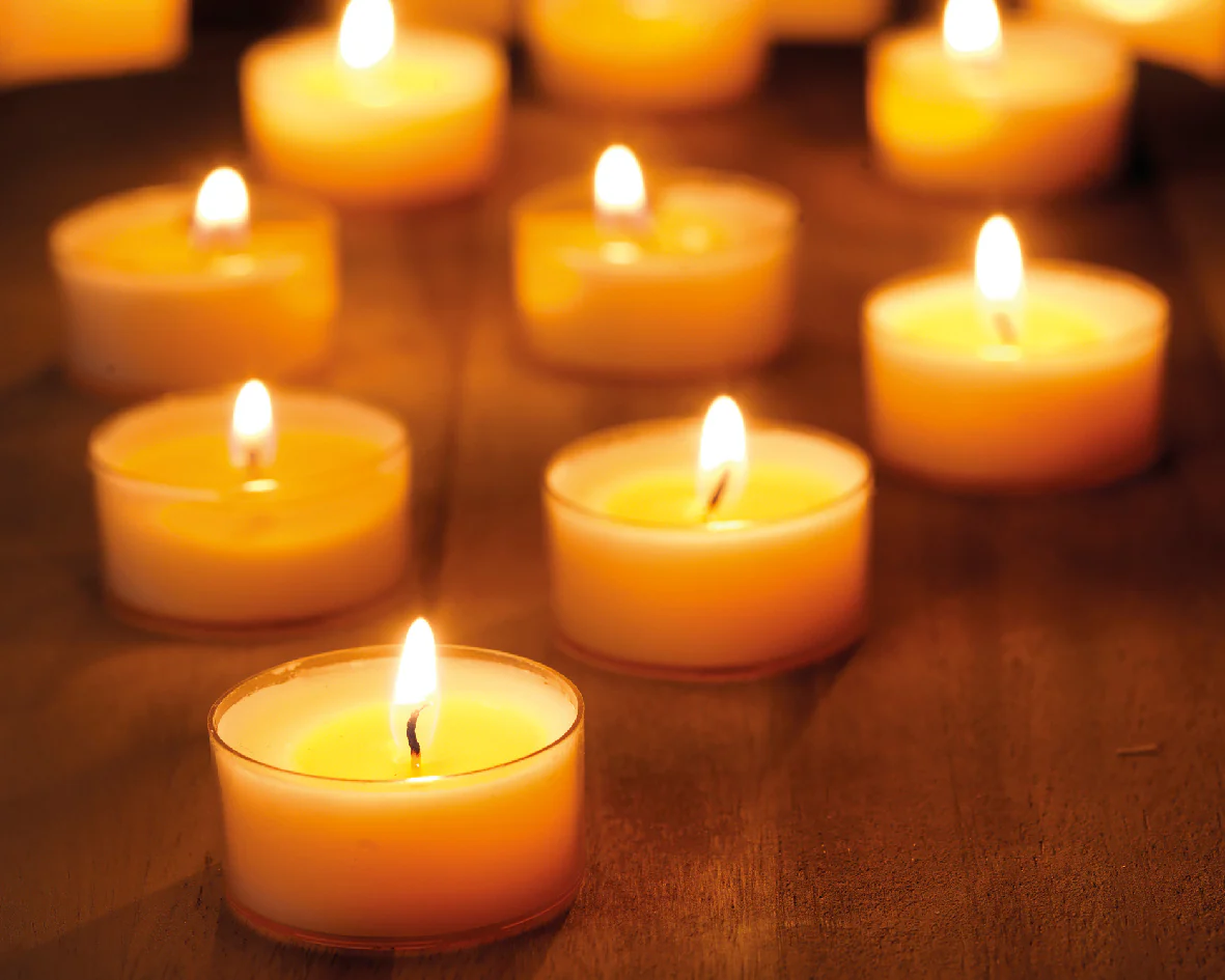 Pack of 18 Scented Cream Tea Light Candles - Image 2